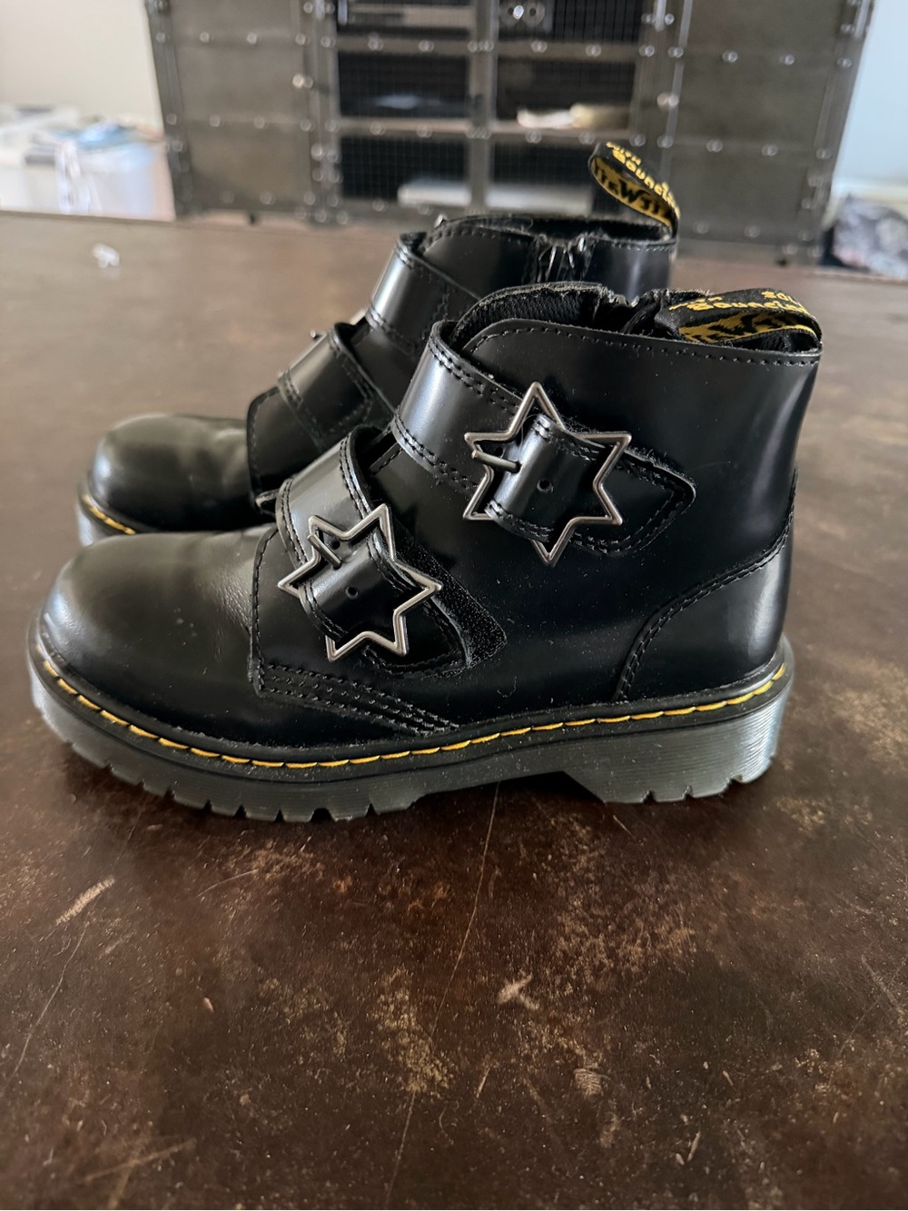 Dr. Martens Black Kids Star Buckle Ankle Boots with Yellow Stitching